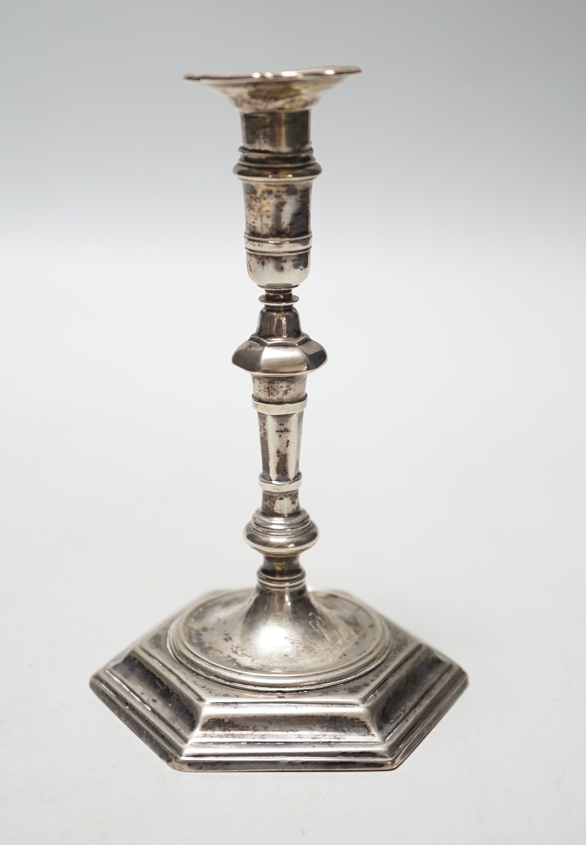 A George II cast silver taper stick, James Gould, London, 1732, 10.8cm, 3oz, with later? unmarked sconce.